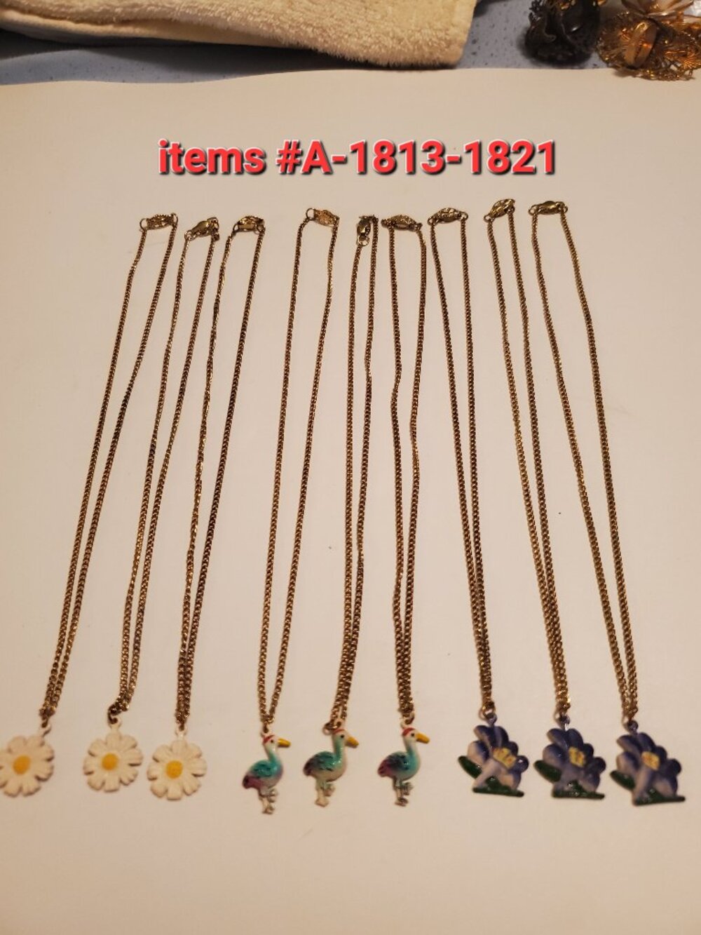 9 Gold Chains Necklaces with Pendants, items #A 1813-1821,  wt. 29 grams.
